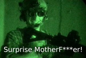 Guy smiling with night vision goggles Surprise motherf--